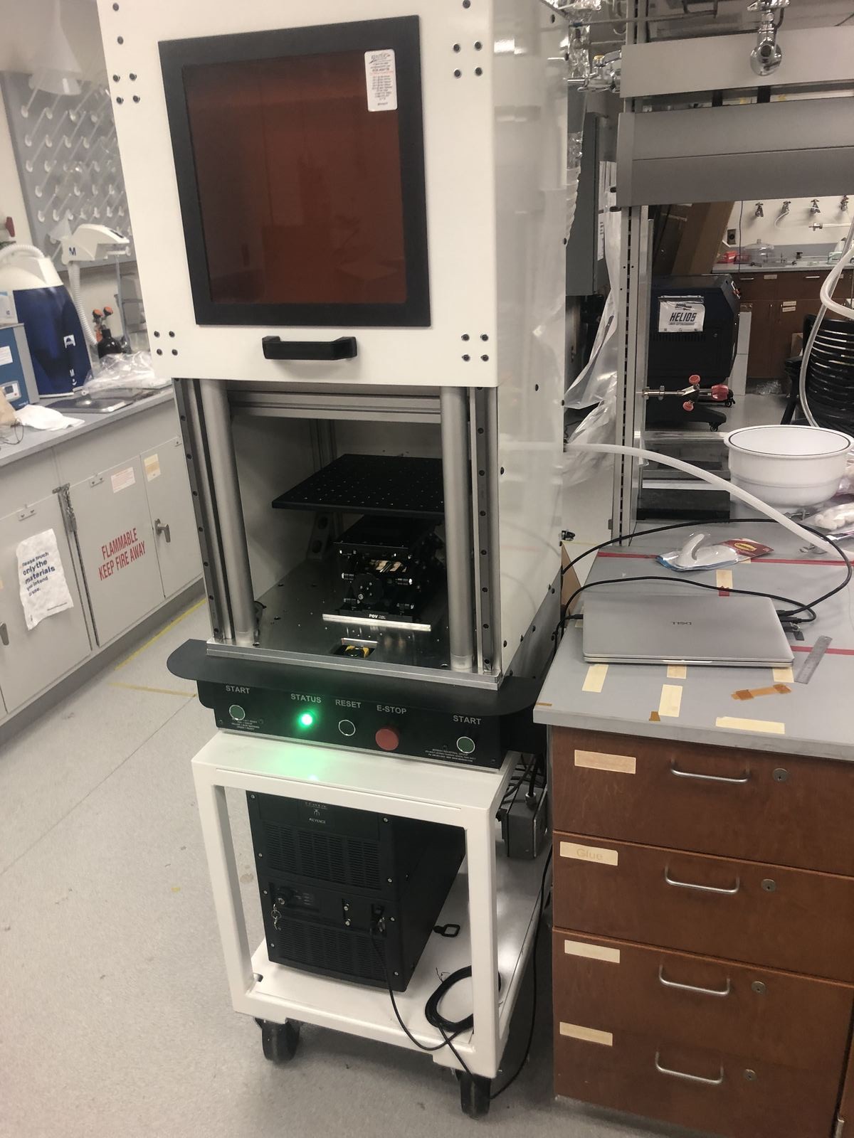 Close-up of the pulsed laser setup used to irradiate the steel coupons
